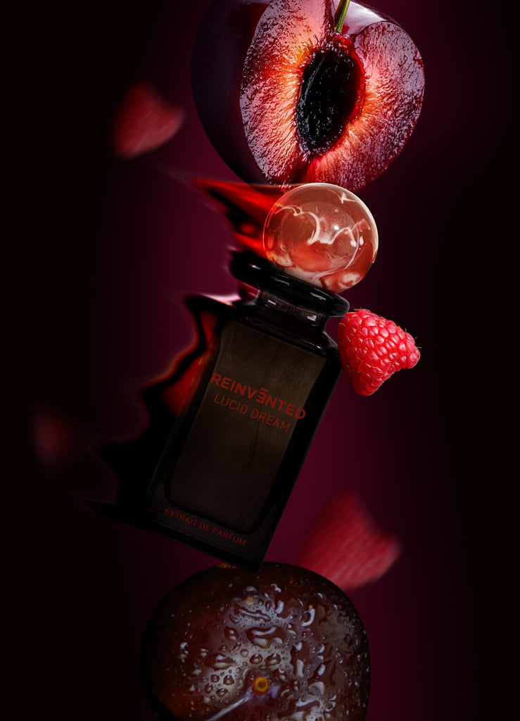 lucid dream perfume bottle by Reinvented Parfums, niche fragrance saffron rose oud, luxury unisex perfume flatlay, dreamy surreal perfume imagery